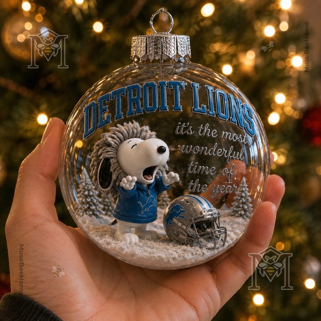 Detroit Lions Snoopy Christmas Snow Globe Ornament 2026 - detailed view of lion mane and team helmet