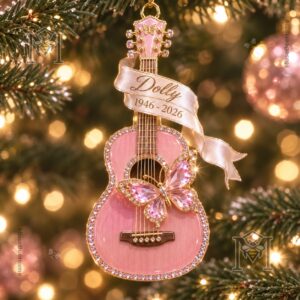 Dolly Parton 1946-2026 Memorial Ornament - close-up of guitar-shaped pink ornament