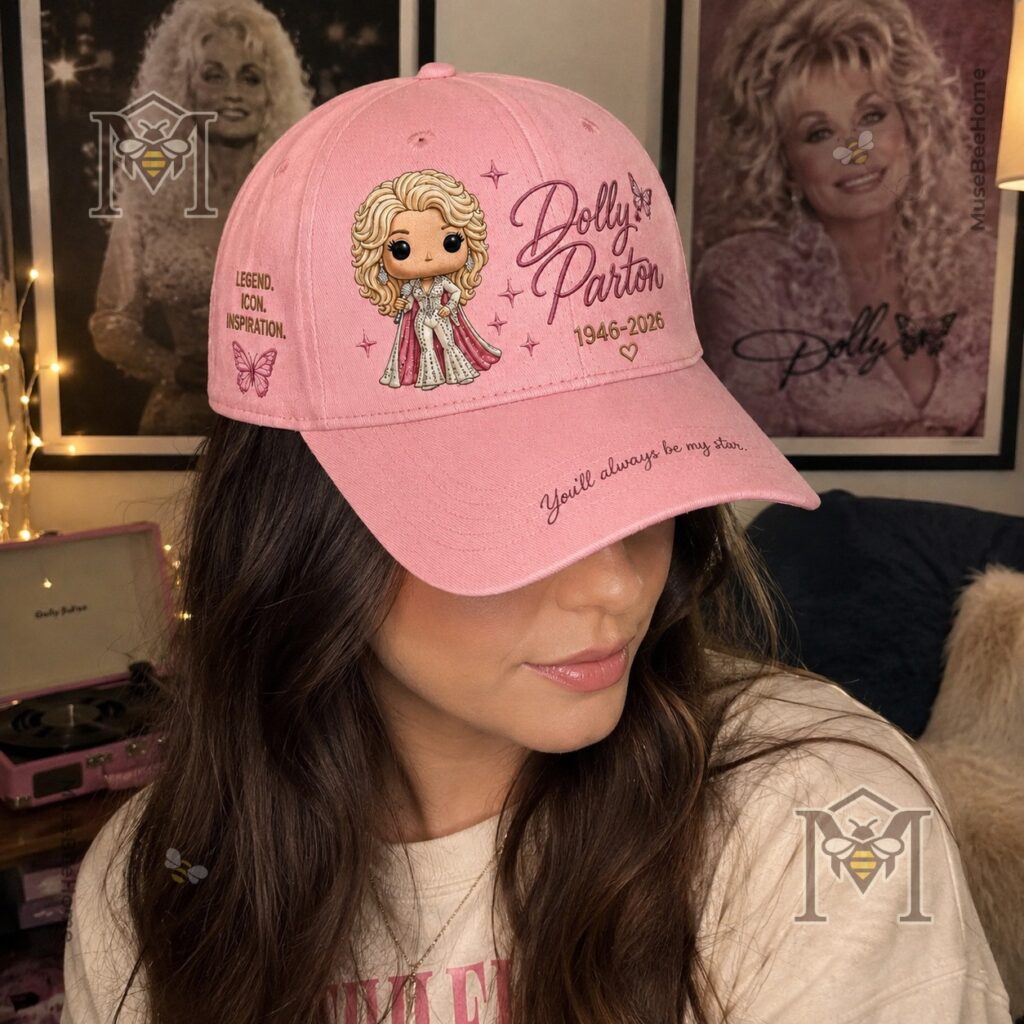 Detailed view of the side of the pink Dolly Parton hat cap showing "LEGEND. ICON. INSPIRATION."