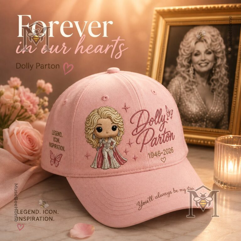 Pink Dolly Parton memorial hat cap displayed with roses and a framed portrait