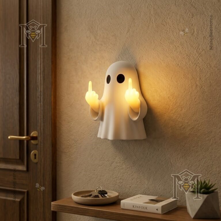 Funny Ghost Flipping Middle Finger Wall Lamp - mounted on a light-colored wall next to a wooden door