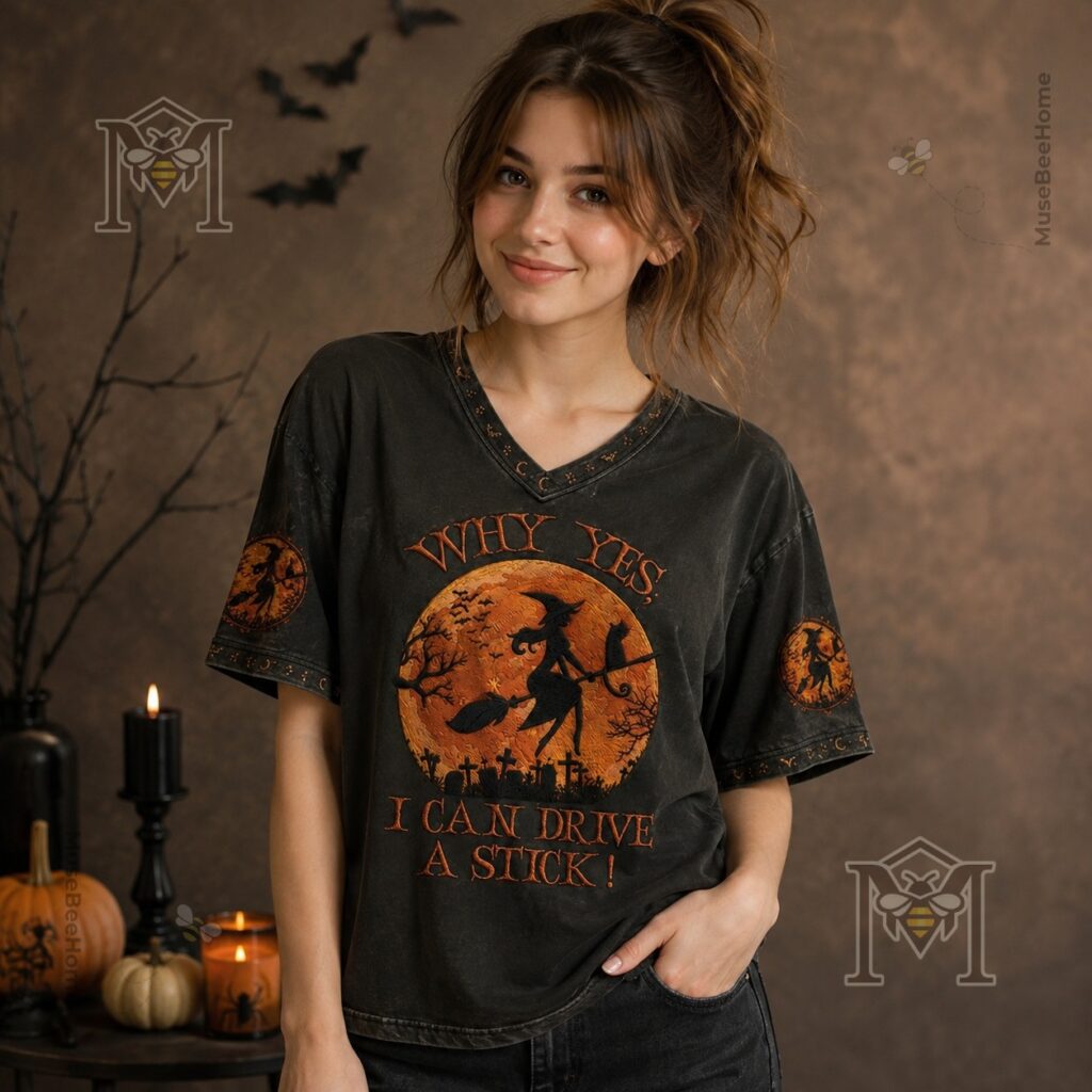 Halloween Witch Flying Broomstick I Can Drive A Stick V-Neck T-Shirt - close-up on bottom left with pumpkin
