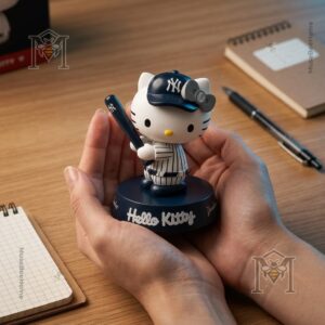 Hello Kitty New York Yankees Collectible Bobblehead Figure 2026 - front view with baseball and Yankees cap