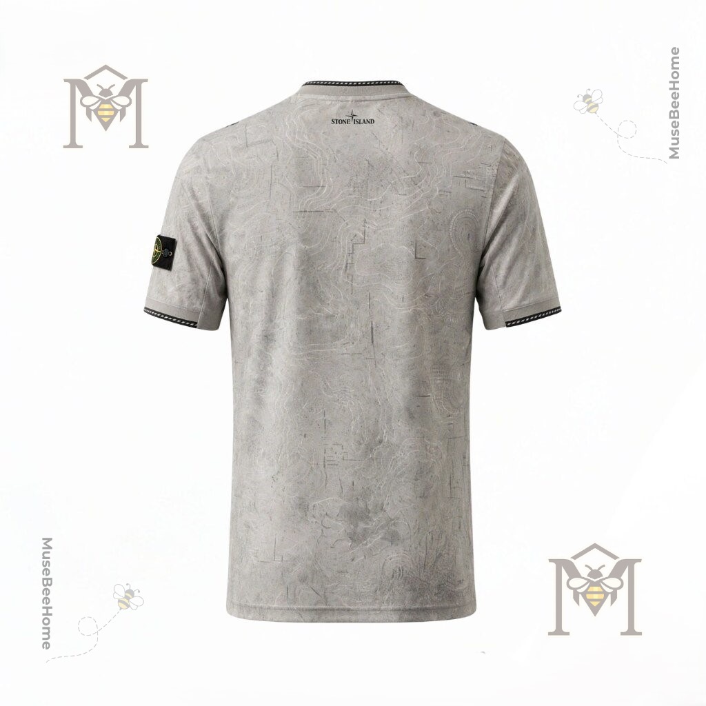 Manchester City Stone Island 2026/27 Kit Football Jersey - close-up of club badge and Stone Island sleeve