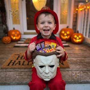 Michael Myers Spooky Trick or Treat Halloween Candy Bucket - side close-up of mask detail with scattered