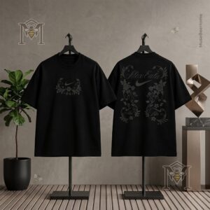 Nike Alexandra Eala Floral 2026 Black T-Shirt - close-up of front design with floral wreath and Nike swoosh