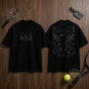 Nike Alexandra Eala Floral 2026 Black T-Shirt - front and back views on wooden surface with tennis racket and