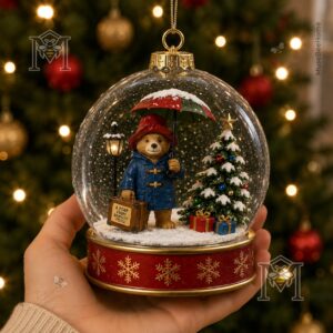 Paddington Bear Christmas Snow Scene Journey Snow Globe Ornament - close-up of base and suitcase