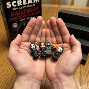 Close-up of the Scream 30th Anniversary calendar box and middle two rows of collectible figurines