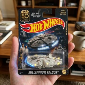 Close-up of Millennium Falcon model and Star Wars characters like Luke and Leia on package