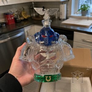 Warhammer 40K Ultramarines 40th Anniversary Whiskey Bottle Decanter - close-up of body with anniversary text