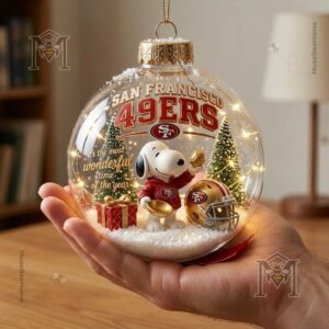 San Francisco 49ers Snoopy Christmas Ornament - full bauble displayed with holiday decorations