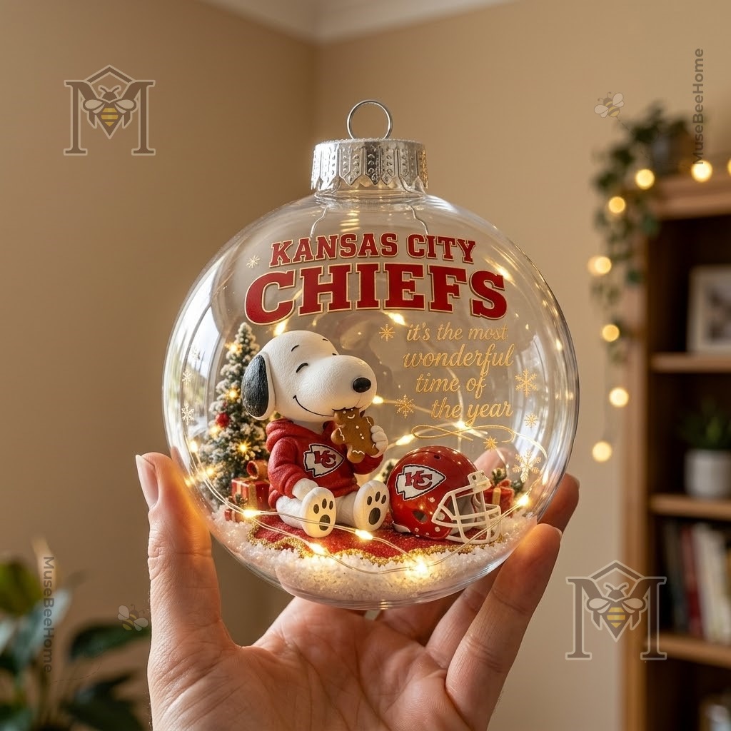 Snoopy Kansas City Chiefs Christmas Global Ornament 2026 - spherical bauble displayed with hanging cap