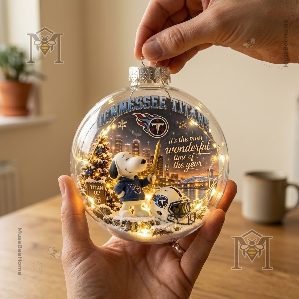 Tennessee Titans Snoopy Global Ornament 2026 - hanging ornament view with snowy Christmas scene